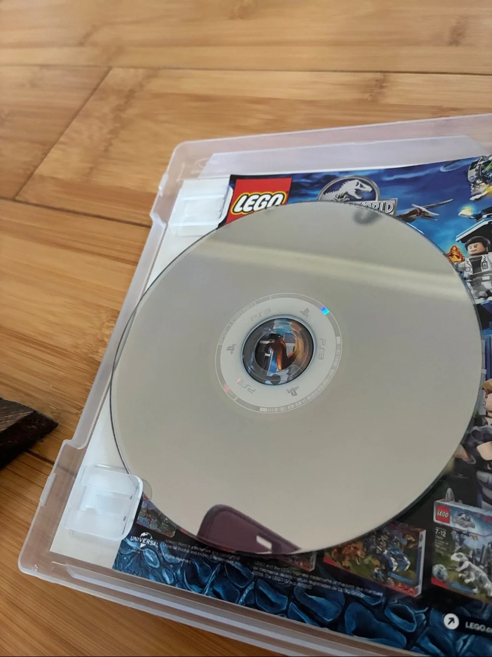 PS3 Thee Game Lot  GTA 5, Lego, Jurassic World, and sonic ultimate Genesis